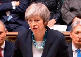 British Prime Minister Theresa May informing the House of Commons Monday that the vote on the EU-UK withdrawal agreement was being deferred.
