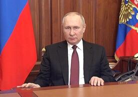 Russian President Vladimir Putin speaking to the Russian people this morning as the invasion of Ukraine began.